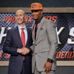 North Carolina State's T.J. Warren, right, poses for a photo with NBA Commissioner Adam Silver after being selected 14th overall by the Phoenix Suns during the 2014 NBA draft, Thursday, June 26, 2014, in New York. (AP Photo/Jason DeCrow)