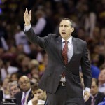 Cleveland Cavaliers head coach David Blatt calls a play during the first half of Game 6 of basketball's NBA Finals against the Golden State Warriors, in Cleveland, Tuesday, June 16, 2015. (AP Photo/Tony Dejak)
