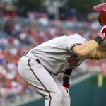 Arizona Diamondbacks' Cliff Pennington slams his helmet down after flying out to Washington Nationals right fielder Jayson Werth to make the last out of the third inning of a baseball game on Thursday, Aug. 21, 2014, in Washington. The Nationals defeated the Diamondbacks 1-0. (AP Photo/Evan Vucci)