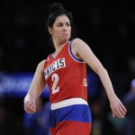 Sarah Silverman jokes with a player during the first half of the NBA All-Star celebrity basketball game Friday, Feb. 13, 2015, in New York. (AP Photo/Frank Franklin II)