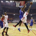 Houston Rockets' Terrence Jones, right, is blocked by Los Angeles Clippers' DeAndre Jordan (6) as he tries to score during the first half of Game 1 in a second-round NBA basketball playoff series Monday, May 4, 2015, in Houston. (AP Photo/David J. Phillip)