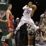 Milwaukee Bucks' Giannis Antetokounmpo (34) looks to pass against the Chicago Bulls' Mike Dunleavy during the first half of Game 6 of an NBA basketball first-round playoff series Thursday, April 30, 2015, in Milwaukee. (AP Photo/Jeffrey Phelps)