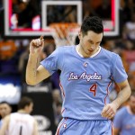 Los Angeles Clippers' J.J. Redick pumps his fist after making a 3-pointer against the Phoenix Suns to beat the buzzer during the second half of an NBA basketball game Sunday, Jan. 25, 2015, in Phoenix. The Clippers defeated the Suns 120-100. (AP Photo/Ross D. Franklin)