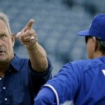 Kansas City Royals hall of famer George Brett talks to manager Ned Yost (3) during baseball practice Monday, Oct. 20, 2014, in Kansas City, Mo. The Royals will host the San Francisco Giants in Game 1 of the World Series on Oct. 21. (AP Photo/Charlie Riedel)
