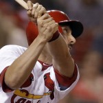 St. Louis Cardinals' Matt Carpenter watches his RBI single during the eighth inning of a baseball game against the Arizona Diamondbacks on Thursday, May 22, 2014, in St. Louis. (AP Photo/Jeff Roberson)
