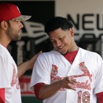 St. Louis Cardinals starting pitcher Carlos Martinez, right, talks with teammate Jaime Garcia in the dugout after working the sixth inning of a baseball game against the Arizona Diamondbacks, Monday, May 25, 2015, in St. Louis. (AP Photo/Jeff Roberson)