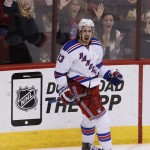 New York Rangers right wing Kevin Hayes celebrates after scoring against the Arizona Coyotes during the third period of an NHL hockey game, Saturday, Feb. 14, 2015, in Glendale, Ariz. The Rangers won 5-1. (AP Photo/Rick Scuteri)