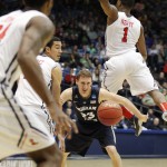Brigham Young's Skyler Halford (23) loses the ball against Mississippi in the second half of a first round NCAA tournament game, Tuesday, March 17, 2015 in Dayton, Ohio. (AP Photo/Skip Peterson)