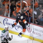 Anaheim Ducks' Mathieu Perreault, center, celebrates his goal near Dallas Stars' Vernon Fiddler during the first period in Game 1 of the first-round NHL hockey Stanley Cup playoff series on Wednesday, April 16, 2014, in Anaheim, Calif. (AP Photo/Jae C. Hong)
