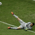 Brazil's goalkeeper Julio Cesar saves a shot during the World Cup third-place soccer match between Brazil and the Netherlands at the Estadio Nacional in Brasilia, Brazil, Saturday, July 12, 2014. (AP Photo/Themba Hadebe)