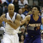 Phoenix Suns guard Gerald Green (14) reaches in knocking loose the ball against Dallas Mavericks forward Richard Jefferson (24) during the first half of an NBA basketball game Friday, Dec. 5, 2014, in Dallas. (AP Photo/LM Otero)
