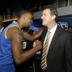 UCLA guard Norman Powell, left, greets head coach Steve Alford during NCAA college basketball Pac-12 media day in San Francisco, Thursday, Oct. 23, 2014. (AP Photo/Jeff Chiu)