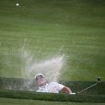 Matt Jones, of Australia, hits out of the bunker on the 18th hole during the second round of the PGA Championship golf tournament at Valhalla Golf Club on Friday, Aug. 8, 2014, in Louisville, Ky. (AP Photo/Mike Groll)
