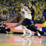 Cleveland Cavaliers forward James Jones (1) reaches for a loose ball during the first half of Game 2 of basketball's NBA Finals against the Golden State Warriors in Oakland, Calif., Sunday, June 7, 2015. (AP Photo/Ben Margot)