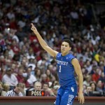 Kentucky guard Devin Booker (1) celebrates after scoring during the second half of an NCAA college basketball game against Alabama, Saturday, Jan. 17, 2015, in Tuscaloosa, Ala. Kentucky won 70-48. (AP Photo/Brynn Anderson)