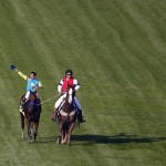 Victor Espinoza celebrates after riding American Pharoah to victory in the 141st running of the Kentucky Derby horse race at Churchill Downs Saturday, May 2, 2015, in Louisville, Ky. (AP Photo/Charlie Riedel)