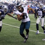 Philadelphia Eagles wide receiver Jordan Matthews (81) evades a tackle-attempt by Dallas Cowboys free safety J.J. Wilcox while heading to the end zone for a touchdown during the first half of an NFL football game, Thursday, Nov. 27, 2014, in Arlington, Texas. (AP Photo/John F. Rhodes)