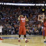  Dayton's Matt Kavanaugh (35), Vee Sanford (43) and Jordan Sibert (24) celebrate during the second half of a third-round game against Syracuse in the NCAA men's college basketball tournament in Buffalo, N.Y., Saturday, March 22, 2014. Dayton won 55-53. (AP Photo/Frank Franklin II)