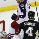  Columbus Blue Jackets' Jack Johnson (7) celebrates his goal in the third period of a first-round NHL playoff hockey game against the Pittsburgh Penguins in Pittsburgh Saturday, April 19, 2014. (AP Photo/Gene J. Puskar)