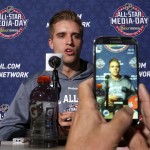 Florida Panthers' Aaron Ekblad answers a question as he is videoed by a reporter during media sday at the NHL All-Star hockey weekend in Columbus, Ohio, Friday, Jan. 23, 2015. (AP Photo/Gene J. Puskar)
