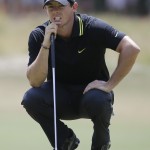 Rory McIlroy, of Northern Ireland, lines up a putt on the second hole during the third round of the U.S. Open golf tournament in Pinehurst, N.C., Saturday, June 14, 2014. (AP Photo/David Goldman)