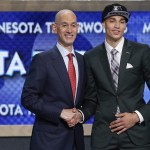 UCLA's Zach LaVine, right, poses for a photo with NBA commissioner Adam Silver after being selected 13th overall by the Minnesota Timberwolves during the 2014 NBA draft, Thursday, June 26, 2014, in New York. (AP Photo/Kathy Willens)
