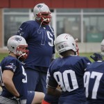 New England Patriots defensive tackle Vince Wilfork (75) warms up with teammates during practice Thursday, Jan. 29, 2015, in Tempe, Ariz. The Patriots play the Seattle Seahawks in NFL football Super Bowl XLIX Sunday, Feb. 1. (AP Photo/Mark Humphrey)

