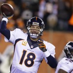 Denver Broncos quarterback Peyton Manning throws during the first half of an NFL football game against the Cincinnati Bengals on Monday, Dec. 22, 2014, in Cincinnati. (AP Photo/Michael Conroy)