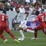 United States' Clint Dempsey, center, moves the ball under pressure by Panama's Harold Cummings, left, and Chin Hormechea during the second half of a friendly soccer match, Sunday, Feb. 8, 2015, in Carson, Calif. The United States won 2-0. (AP Photo/Jae C. Hong)