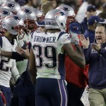 New England Patriots head coach Bill Belichick, right, celebrates with his team during the second half of NFL Super Bowl XLIX football game against the Seattle Seahawks on Sunday, Feb. 1, 2015, in Glendale, Ariz. (AP Photo/Elise Amendola)