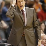 Utah Jazz coach Quin Snyder talks to a player during the second half of the Jazz's NBA basketball game against the Phoenix Suns, Friday, Feb. 6, 2015, in Phoenix. The Suns won 100-93. (AP Photo/Matt York)
