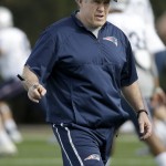 New England Patriots head coach Bill Belichick watches his players warm up during practice Wednesday, Jan. 28, 2015, in Tempe, Ariz. The Patriots play the Seattle Seahawks in NFL football Super Bowl XLIX Sunday, Feb. 1, in Glendale, Ariz. (AP Photo/Mark Humphrey)
