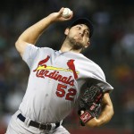 St. Louis Cardinals' Michael Wacha throws a pitch against the Arizona Diamondbacks during the first inning of a baseball game Friday, Sept. 26, 2014, in Phoenix. (AP Photo/Ross D. Franklin)