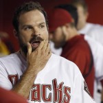  Arizona Diamondbacks' Josh Collmenter wipes his face in the dugout after giving up two runs to the Houston Astros during the first inning of a baseball game on Monday, June 9, 2014, in Phoenix. (AP Photo/Ross D. Franklin)