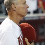 Arizona Diamondbacks interim manager Alan Trammell stands for the national anthem prior to a baseball game against the St. Louis Cardinals on Friday, Sept. 26, 2014, in Phoenix. Diamondbacks manager Kirk Gibson was fired earlier in the day. (AP Photo/Ross D. Franklin)