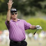  Miguel Angel Jimenez, of Spain, urges his ball on after hitting on the eighth fairway during the fourth round of the Masters golf tournament Sunday, April 13, 2014, in Augusta, Ga. (AP Photo/David J. Phillip)