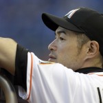 Miami Marlins left fielder Ichiro Suzuki the team's baseball game against the Arizona Diamondbacks from the dugout in the second inning Tuesday, May 19, 2015, in Miami. (AP Photo/Alan Diaz)