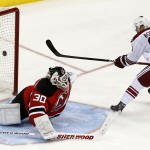  Phoenix Coyotes left wing Mikkel Boedker (89), of Denmark, scores a goal on New Jersey Devils goalie Martin Brodeur during a shootout in an NHL hockey game, Thursday, March 27, 2014, in Newark, N.J. The Coyotes won 3-2. (AP Photo/Julio Cortez)