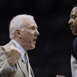  San Antonio Spurs coach Gregg Popovich, left, argues a call during the first quarter of Game 1 of the opening-round NBA basketball playoff series against the Dallas Mavericks, Sunday, April 20, 2014, in San Antonio. (AP Photo/Eric Gay)