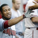  Arizona Diamondbacks' Alfredo Marte celebrates with teammates after A.J. Pollock hit a single during the fifth inning of an interleague baseball game against the Chicago White Sox in Chicago on Saturday, May 10, 2014. (AP Photo/Nam Y. Huh)