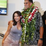 Former Oregon quarterback Marcus Mariota, right, poses for a picture with a family friend at the Saint Louis Alumni Clubhouse on NFL Draft Day Thursday, April 30, 2015, in Honolulu. (Thomas Boyd/The Oregonian via AP, Pool)