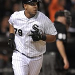  Chicago White Sox's Jose Abreu watches his solo home run during the seventh inning of a baseball game against the Arizona Diamondbacks in Chicago, Friday, May 9, 2014. (AP Photo/Paul Beaty)