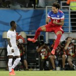 Ghana's Christian Atsu, left, looks back at his goal as United States' Jermaine Jones celebrates Clint Dempsey's goal during the group G World Cup soccer match between Ghana and the United States at the Arena das Dunas in Natal, Brazil, Monday, June 16, 2014. (AP Photo/Petr David Josek)