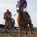California Chrome, front, ridden by jockey Victor Espinoza, wins the 139th Preakness Stakes horse race at Pimlico Race Course, Saturday, May 17, 2014, in Baltimore.(AP Photo/Matt Slocum)