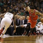 Chicago Bulls' Derrick Rose (1) steals the ball from Milwaukee Bucks' Khris Middleton during the first half of Game 6 of an NBA basketball first-round playoff series Thursday, April 30, 2015, in Milwaukee. (AP Photo/Jeffrey Phelps)