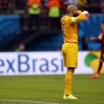  United States' goalkeeper Tim Howard stands near his goal after being scored on by Portugal's Nani during the group G World Cup soccer match between the United States and Portugal at the Arena da Amazonia in Manaus, Brazil, Sunday, June 22, 2014. (AP Photo/Julio Cortez)