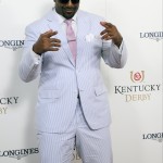 Chris Canty dances on the red carpet at the 2015 Kentucky Derby on Saturday, May 2, 2015 at Churchill Downs in Louisville, Ky. (Photo by Joe Imel/Invision/AP)