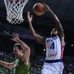 Dominican Republic's Edgar Sosa, right, vies for the ball over Slovenia's during Basketball World Cup Round of 16 match between Dominican Republic and Slovenia at the Palau Sant Jordi in Barcelona, Spain, Saturday, Sept. 6, 2014. The 2014 Basketball World Cup competition will take place in various cities in Spain from Aug. 30 through to Sept. 14. (AP Photo/Manu Fernandez)