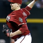 Arizona Diamondbacks pitcher Trevor Cahill throws against the Detroit Tigers during the first inning of a baseball game, Wednesday, July 23, 2014, in Phoenix. (AP Photo/Matt York)