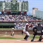 Chicago Cubs starting pitcher Jeff Samardzija delivers a pitch to Arizona Diamondbacks Martin Prado during the first inning at the 100th anniversary of the first baseball game at Wrigley Field, Wednesday, April 23, 2014, in Chicago. (AP Photo/Charles Rex Arbogast)